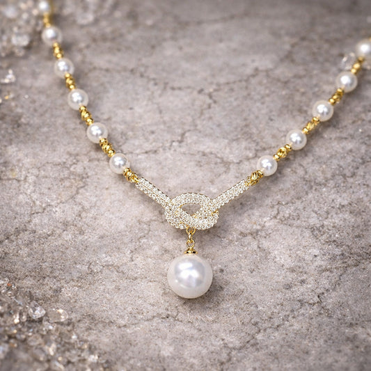 Eterna Pearl Knot Necklace