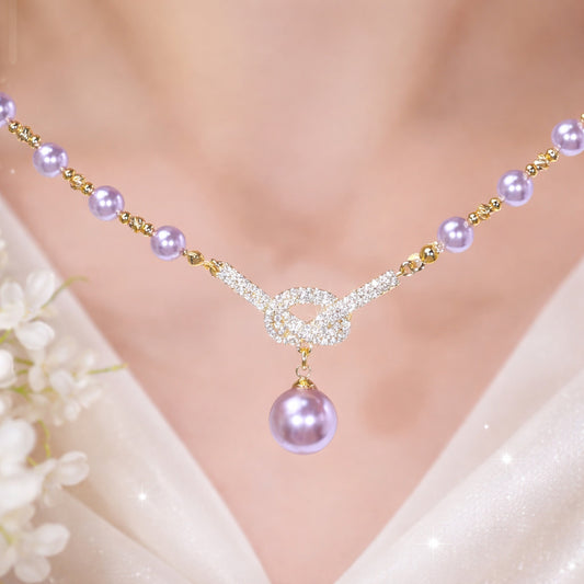 Eterna Pearl Knot Necklace